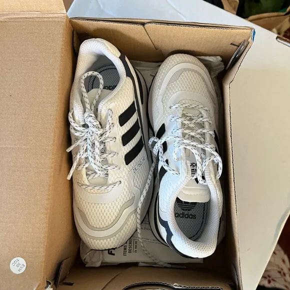 New in the box: black &amp; white adidas originals size 11 kids